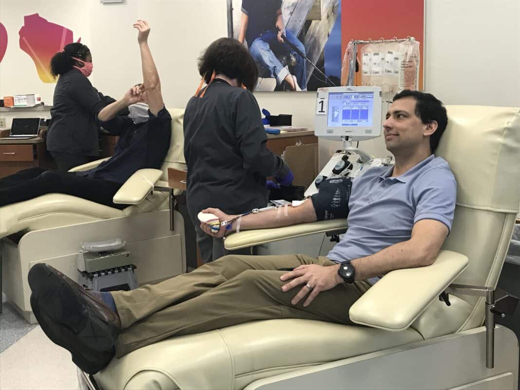 Dr. Lal donated plasma at Versiti's downtown Milwaukee donation center.
