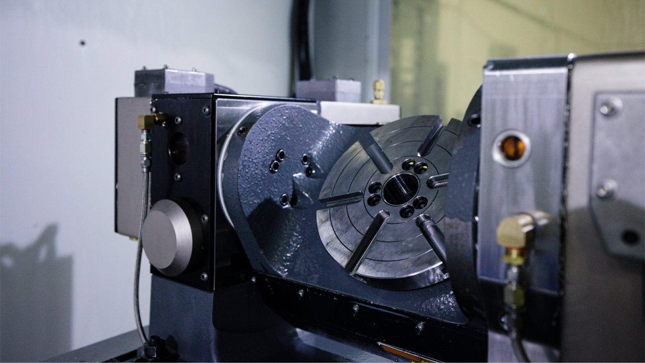 A 5th axis rotary table in a CNC machining center at PartsBadger’s Cedarburg headquarters.
