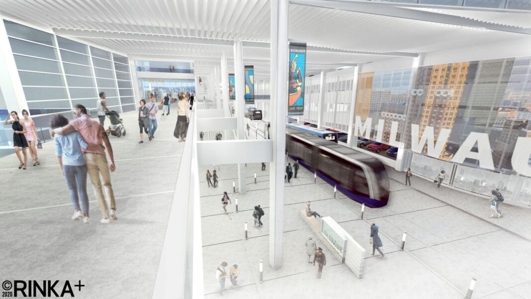 View of the ground level transit concourse from the second floor concourse showing the large format LED screen. Rendering: Rinka