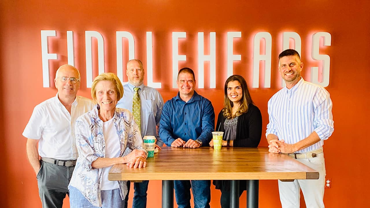 Fiddleheads current owners (left to right) Ray Marcy, Loreen Marcy, Steve Klimczak, R.J. Marcy, Mahnaz Marcy and Mike Wroblewski.