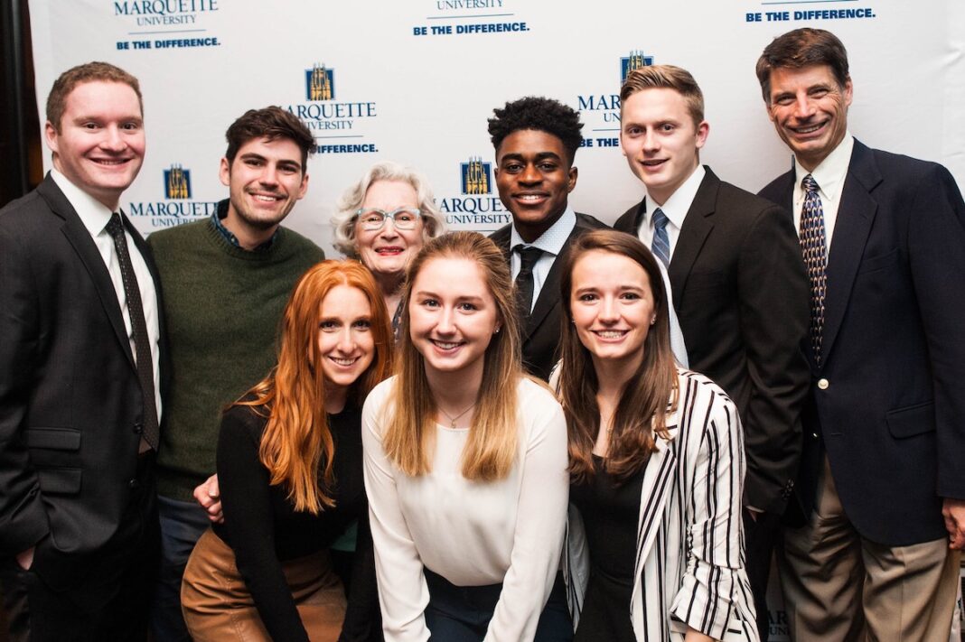 Geraldine “Nana” Fotsch with Marquette University students at a scholarship celebration.