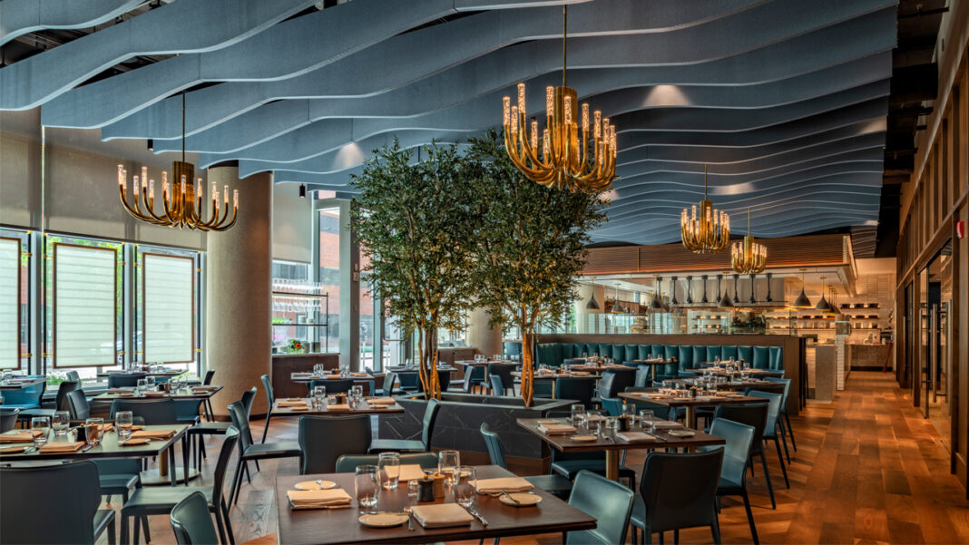 The 84-seat dining room features a chef’s counter facing the expansive open-concept kitchen. Not pictured is the 18-seat horseshoe-shaped front bar and central walk-in wine vault that holds 2,000 bottles.