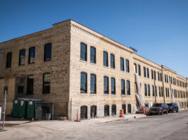 The east block apartment building at the Community Within the Corridor. One of the oldest buildings on the campus, it was built in 1906.