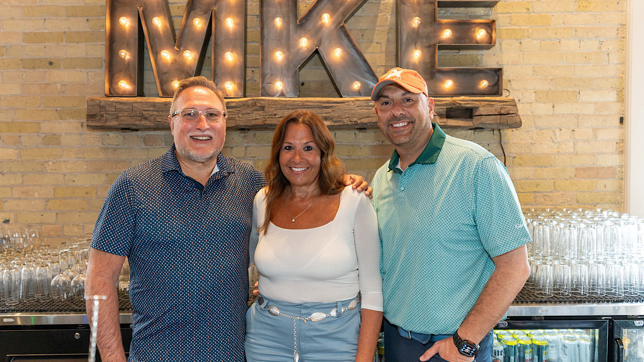 Celebrity bartenders John Halechko (left) of Associated Bank, Anne Zizzo of Zizzo Group and Steve Zandpour of Associated Bank.