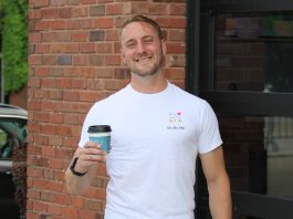 Brad Steckart stands outside of Wantable Cafe, a partner of Sit By Me.