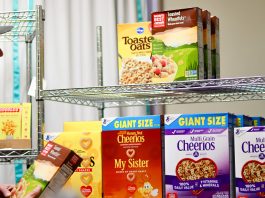 Boxes of cereal and other dry goods line the shelves of Hunger Task Force’s Jim Luther New Hope Center food pantry on Milwaukee’s south side.