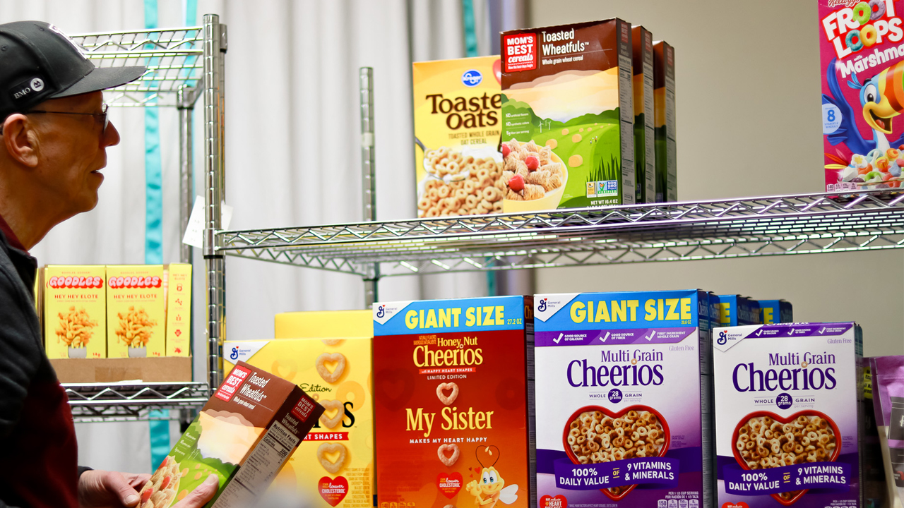 Boxes of cereal and other dry goods line the shelves of Hunger Task Force’s Jim Luther New Hope Center food pantry on Milwaukee’s south side.