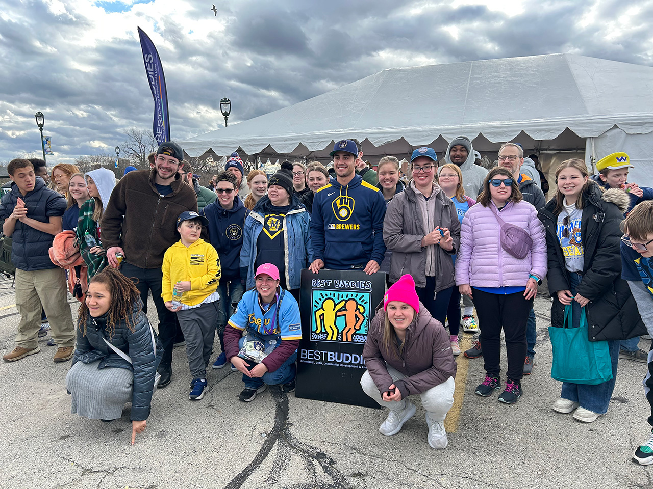 Sal Frelick poses for a photo with Best Buddies during their Milwaukee Brewers tailgate on April 19 at American Family Field. Photo credit: Best Buddies.