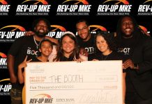 Molly Howard (front, center) and Benjamin Biddle (back, right) are pictured with their family members after winning the 2025 Rev-Up MKE pitch competition.