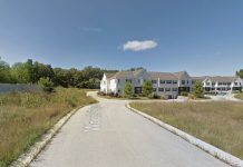 The unfinished foundation, left, and completed condos, right. Image from Google Maps