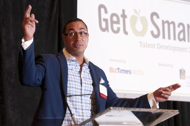 SURG Restaurant Group co-owner and president Omar Shaikh speaks at the 2015 BizTimes Get Smarter Talent Development Conference.