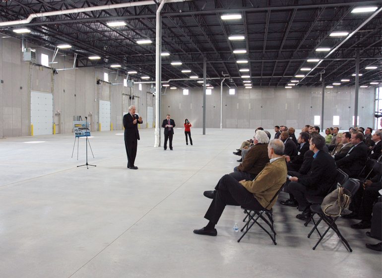 Mayor Tom Barrett addresses attendees at an open house in Century City I.