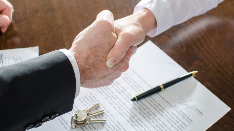 CRE deal-shutterstock_236029696 Commercial real estate deal