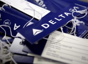 Delta airline name tags are seen at Delta terminal in JFK Airport in New York, July 30, 2008. REUTERS/Joshua Lott/File Photo