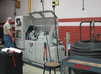 Toolrite’s Wells division manufactures machines that produce springs for the furniture and automotive seating industries. This machine produces a finished spring every second and is capable of making 950 loops per minute.