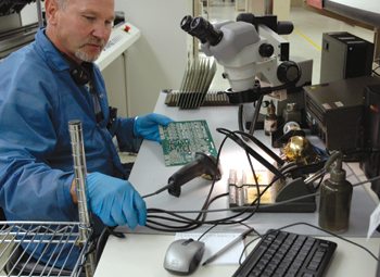 Circuit boards are checked visually by a machine and then also by an operator to ensure all the components are properly attached.