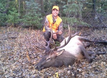 Craig Ogurek poses with an 11-point bull elk he shot in October.