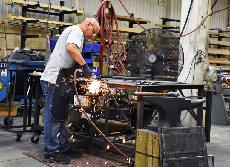 Milwaukee-based Design Specialties makes custom glass fireplace doors.