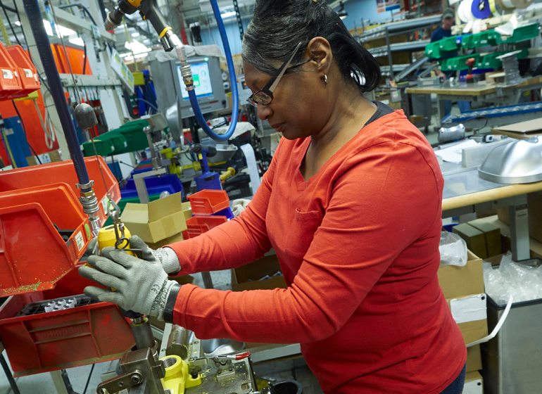 Patricia Hill at work on the factory floor.