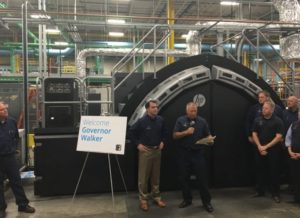 Gov. Scott Walker looks on as Quad/Graphics COO Tom Frankowski talks about the new Midwest Digital Supercenter in Pewaukee.