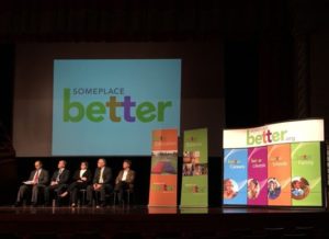 Sheboygan County business leaders onstage for the unveiling of the new "Someplace Better" marketing campaign. 