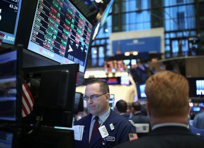 A trader works on the floor of the New York Stock Exchange in New York City on Jan. 19. (REUTERS/Stephen Yang)