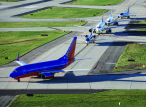 Planes on the runway at Mitchell International Airport. - Erol Reyal photo.