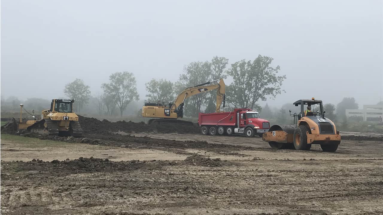 Crews performing site work at the Parterre site in Oak Creek.