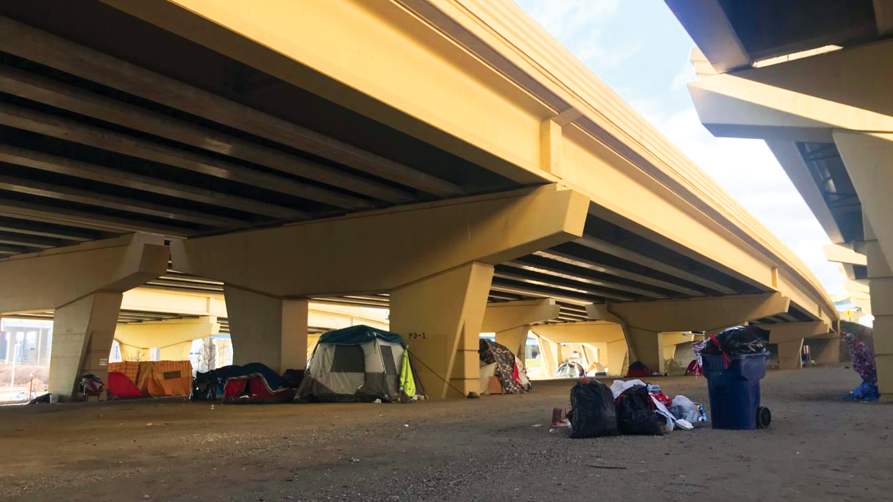 The tent encampment located under the I-794 overpass at the intersection of West Clybourn and North 6th Street.